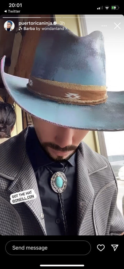 From Vico's Instagram stories, originally a video. Vico wears a blue cowboy hat with rustic leather trimmings. Text reads: "Got the hat @oneill.con."